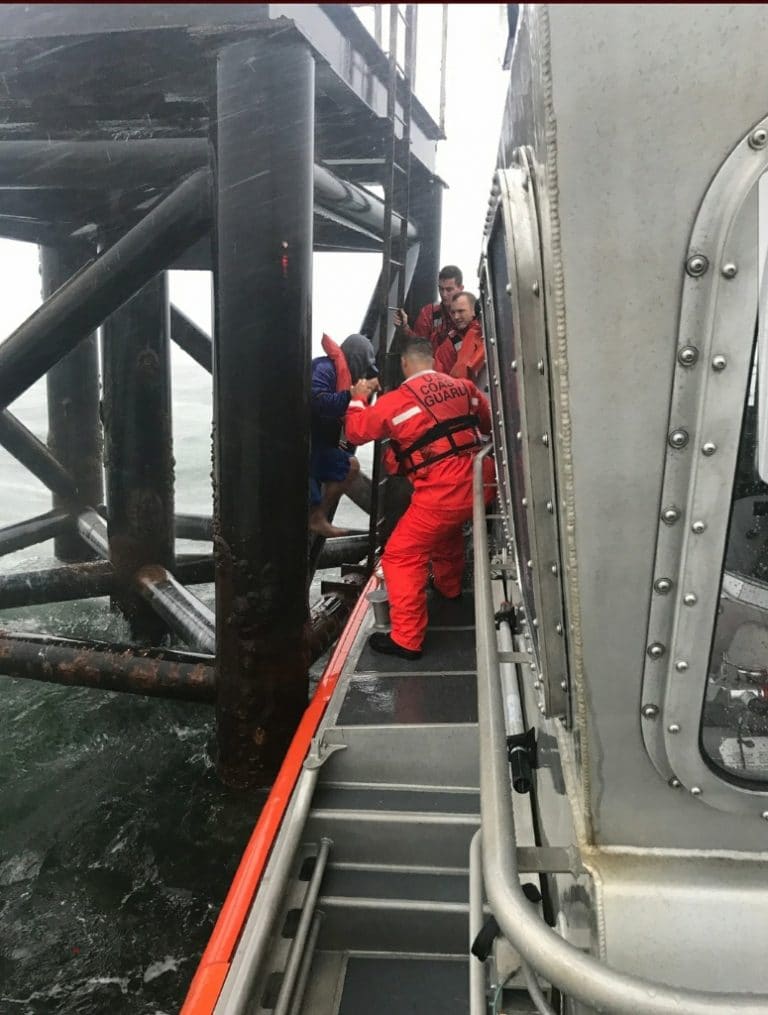 Coast Guard rescues 2 brothers clinging to range light in Tampa Bay