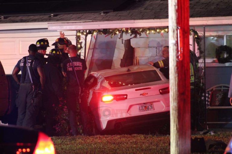 Car crashes into St. Petersburg home after driver flees from traffic stop