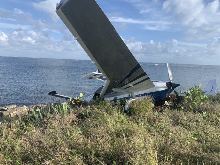 Personal aircraft crashes at end of runway at Albert Whitted Airport