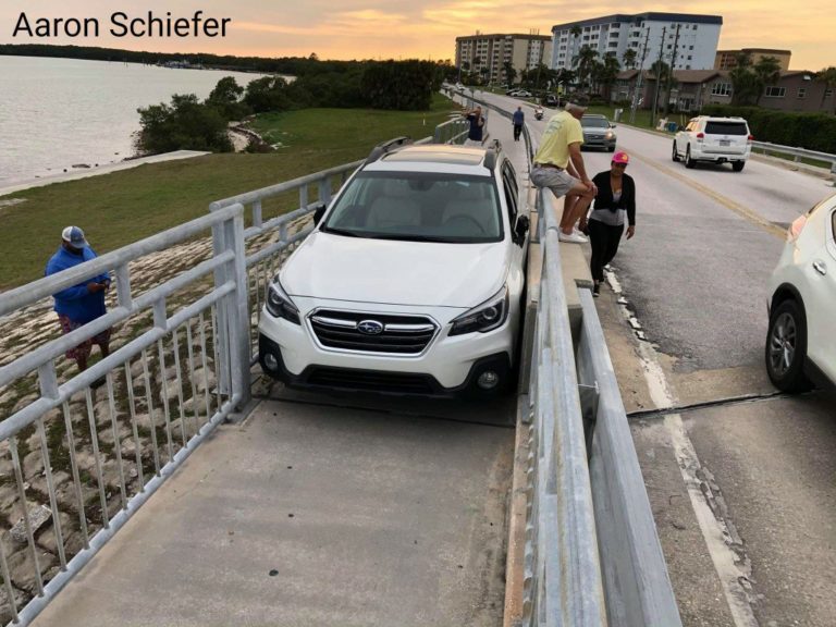 Drunk driver wedges vehicle between railings of pedestrian walkway attempting to drive over Dunedin Causeway