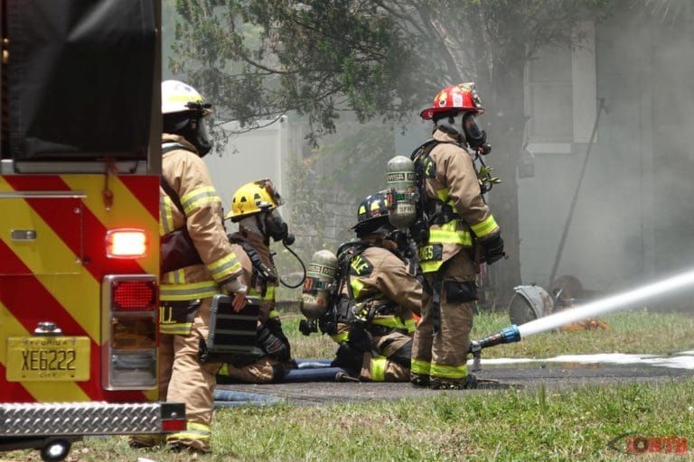 Firefighters battle structure fire at a home in unincorporated Seminole