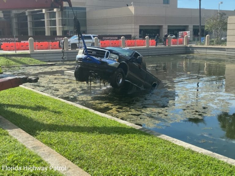 Driver crashes pickup truck into pond at Pinellas Criminal Courts Complex