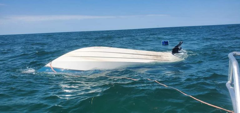 Five people rescued clinging to an overturned boat off Anclote Key